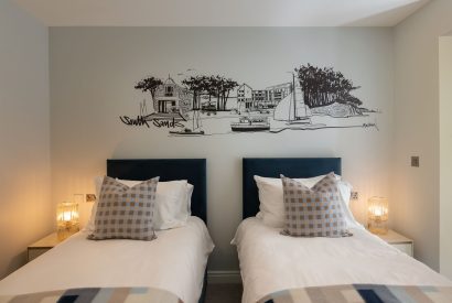 A twin bedroom at Ocean Eyes, Devon 