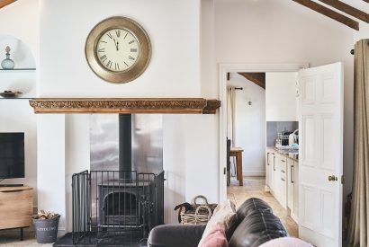 The living room with log burner at Flock Cottage, Welsh Borders