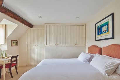 A twin bedroom at Withington Grange, Cotswolds 