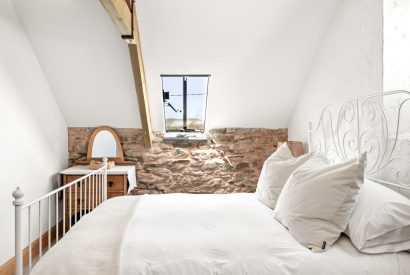 A double bedroom with countryside view at Chapel Cottage, Pembrokeshire