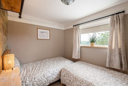 The second bedroom with two single beds at High Moor Cottage, Yorkshire