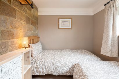 The second bedroom with two single beds at High Moor Cottage, Yorkshire