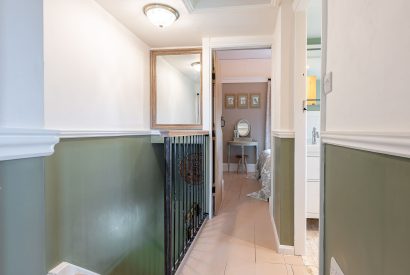 The upstairs hallway leading to the bedrooms and bathroom at High Moor Cottage, Yorkshire