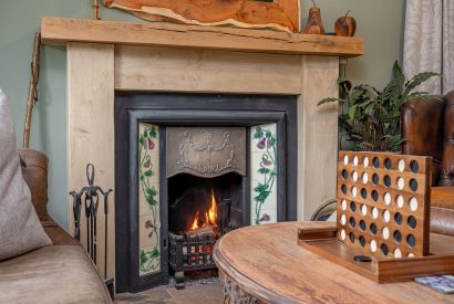 The fireplace in the living room at High Moor Cottage, Yorkshire
