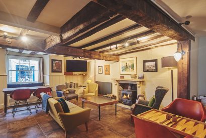 The living room with log burner at Hay Market House, Powys