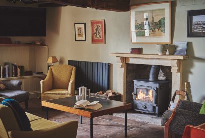 The living room with log burner at Hay Market House, Powys