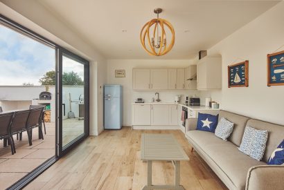 The living room with patio doors at Oakfield, Somerset
