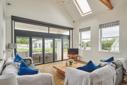 The living room with garden view at Oakfield, Somerset