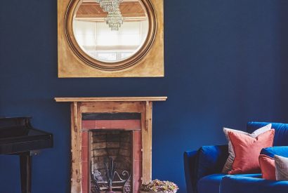The living room with fireplace at The Old Vicarage, Lake District