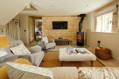 The living room at The Barn at Ampneyfield, Gloucestershire