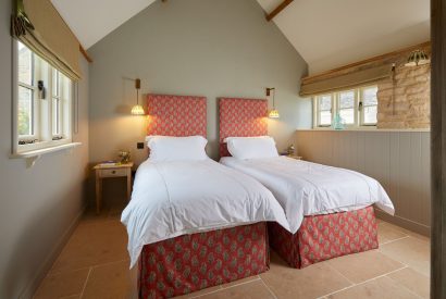 The twin bedroom at The Barn at Ampneyfield, Gloucestershire