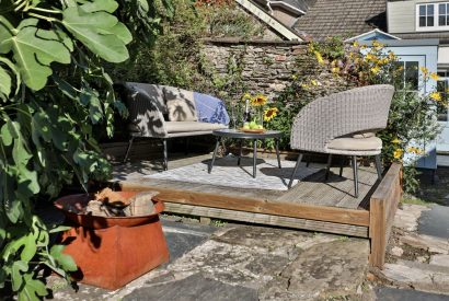 Outdoor seating area at Bluebell Cottage, Devon