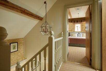 The hallway leading to the bedroom at Orchard Stable, Cotswolds