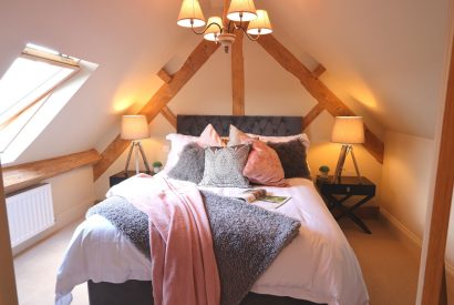 A bedroom at The Carriage House, Cotswolds