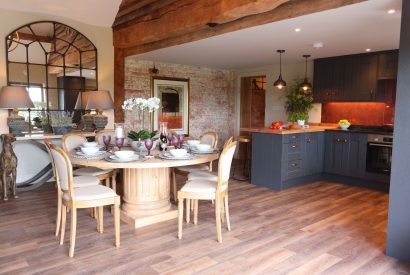 The dining room and kitchen at The Carriage House, Cotswolds
