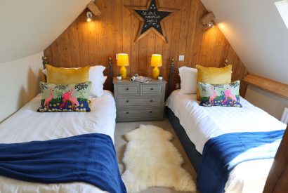 A twin bedroom at The Blended Barn, Cotswolds