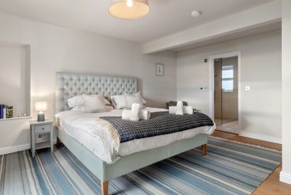 A super king size bedroom at Channel View, Oxwich 