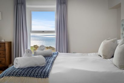 A super king size bedroom at Channel View, Oxwich