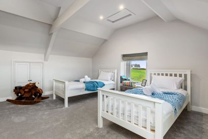 A twin bedroom at Channel View, Oxwich