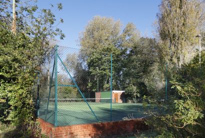 The tennis court at Riverside View, Chiltern Hills