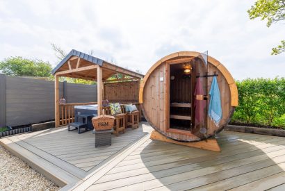 Private hot tub and sauna at The Lodge at Leigh, Dorset