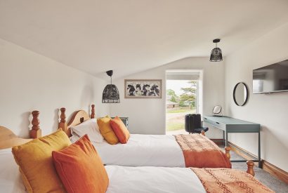 A twin bedroom at Plum Cottage, Lake District