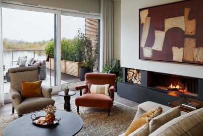 The living room with fire place at The Reserve, Cotswolds