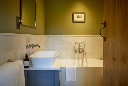 A bathroom at The Barn at Ampneyfield, Gloucestershire