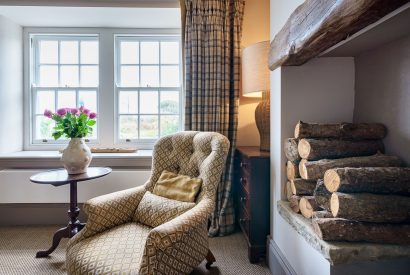 The living room with a log burner at Pen y Bryn, Abersoch