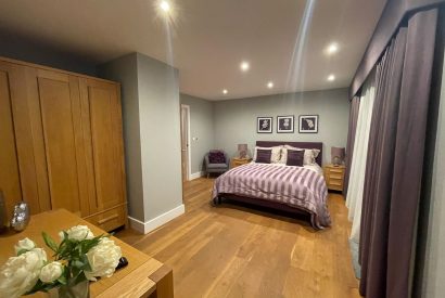 A king size bedroom at The Moorings, Cornwall