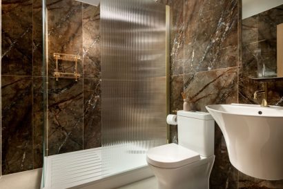 A shower room at Sunset Cottage, Kent