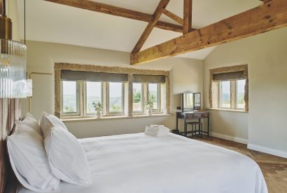 A king size bedroom at Rye Top Farm, Uppermill, Peak District