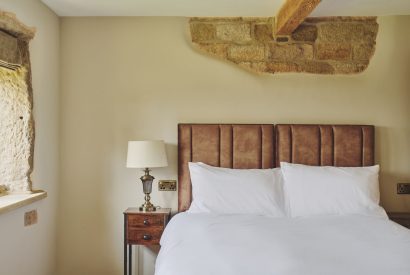 A king size bedroom at Rye Top Farm, Uppermill, Peak District