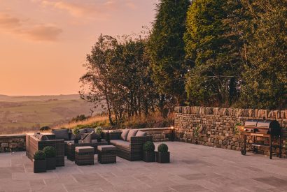 Outdoor dining area at Rye Top Farm, Uppermill, Peak District