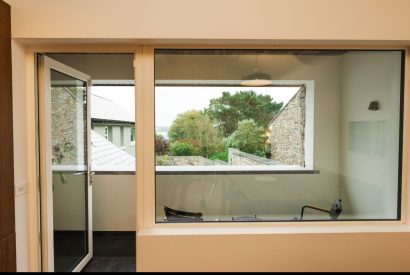 Picture windows at Potter's Cottage, Roundstone, Galway