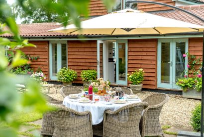 Outdoor dining at Hockham Grange, Norfolk Coast