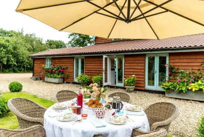 Outdoor dining at Hockham Grange, Norfolk Coast