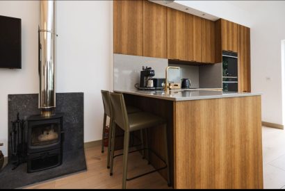 The wood burner at Map Maker's Cottage, Roundstone, Galway