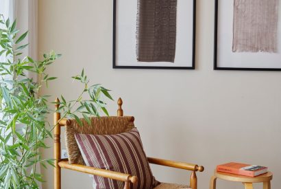 A chair in the living room at Alder Grand Suite, Cotswolds