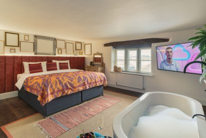 A super king size bedroom at The Great Hall, Chapmanslade, Wiltshire