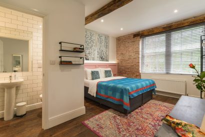 A king size bedroom at The Great Hall, Chapmanslade, Wiltshire