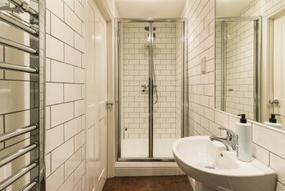 A shower room at The Great Hall, Chapmanslade, Wiltshire