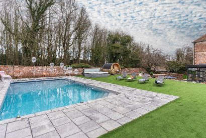 The outdoor swimming pool at The Great Hall, Chapmanslade, Wiltshire