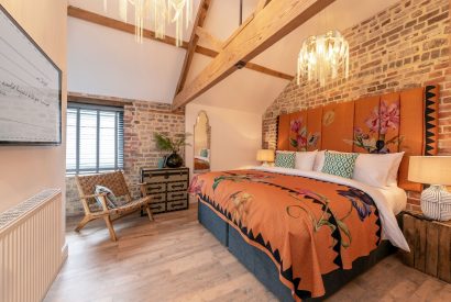 A super king size bedroom at The Pool house, Chapmanslade, Wiltshire