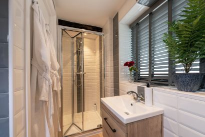 A shower room at The Pool house, Chapmanslade, Wiltshire