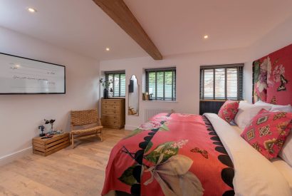 A super king size bedroom at The Pool house, Chapmanslade, Wiltshire