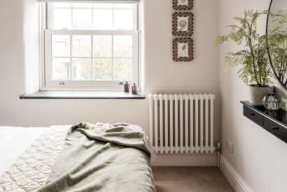 A king size bedroom at Sweet Pea Cottage, Litton, Peak District