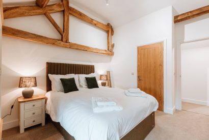 A king size bedroom at Arkle, Shropshire