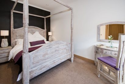 The four poster bed at Lomond House, Loch Lomond