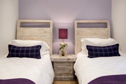 A twin bedroom at Lomond House, Loch Lomond